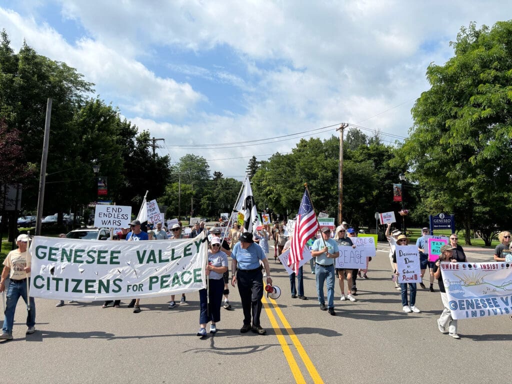 Peaceful protest with banners for peace and justice.