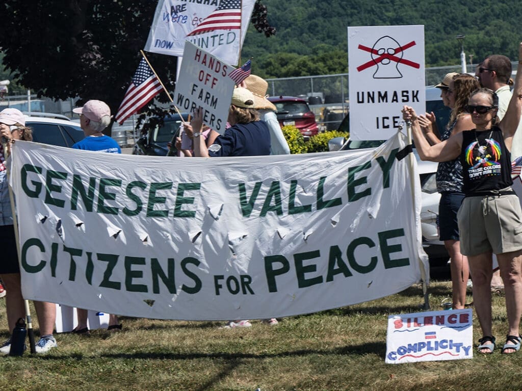 Protest signs for Genesee Valley Citizens for Peace.