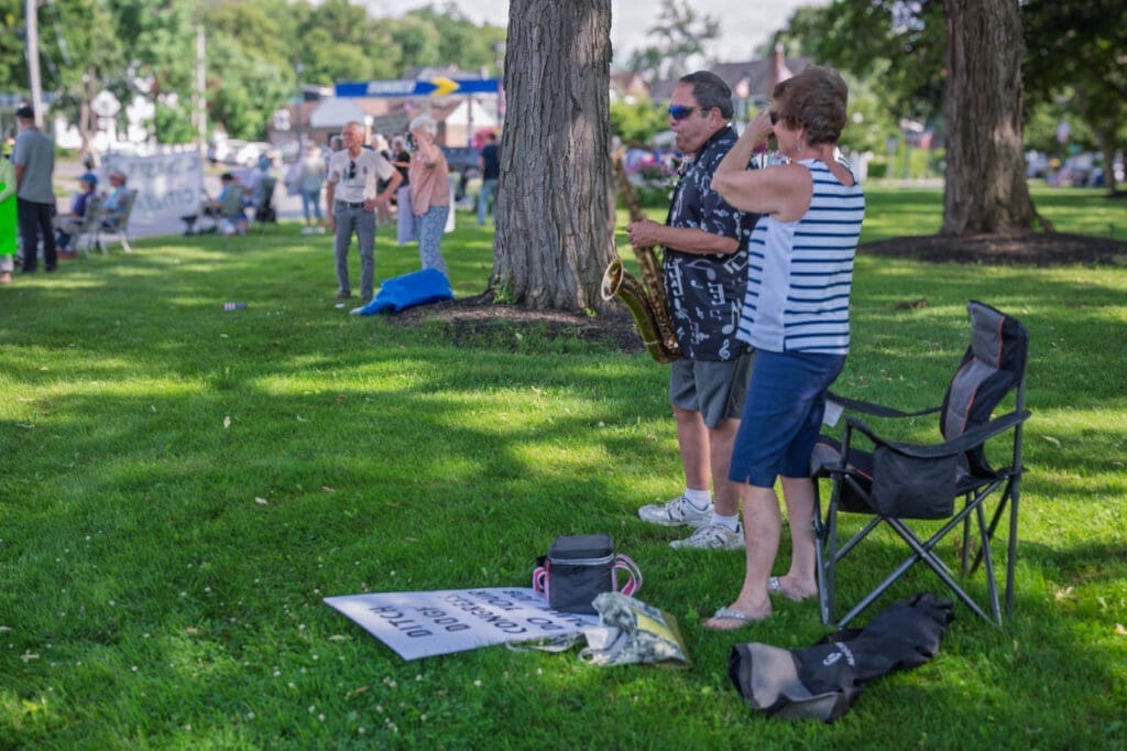 Outdoor music performance in a park setting.