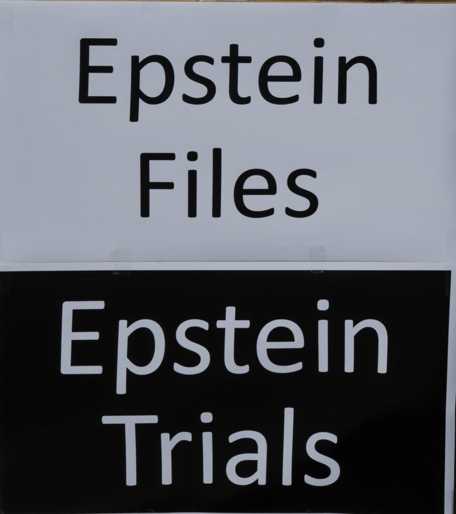 Epstein Files and Epstein Trials text on signs